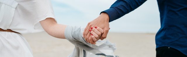 A couple holding hands